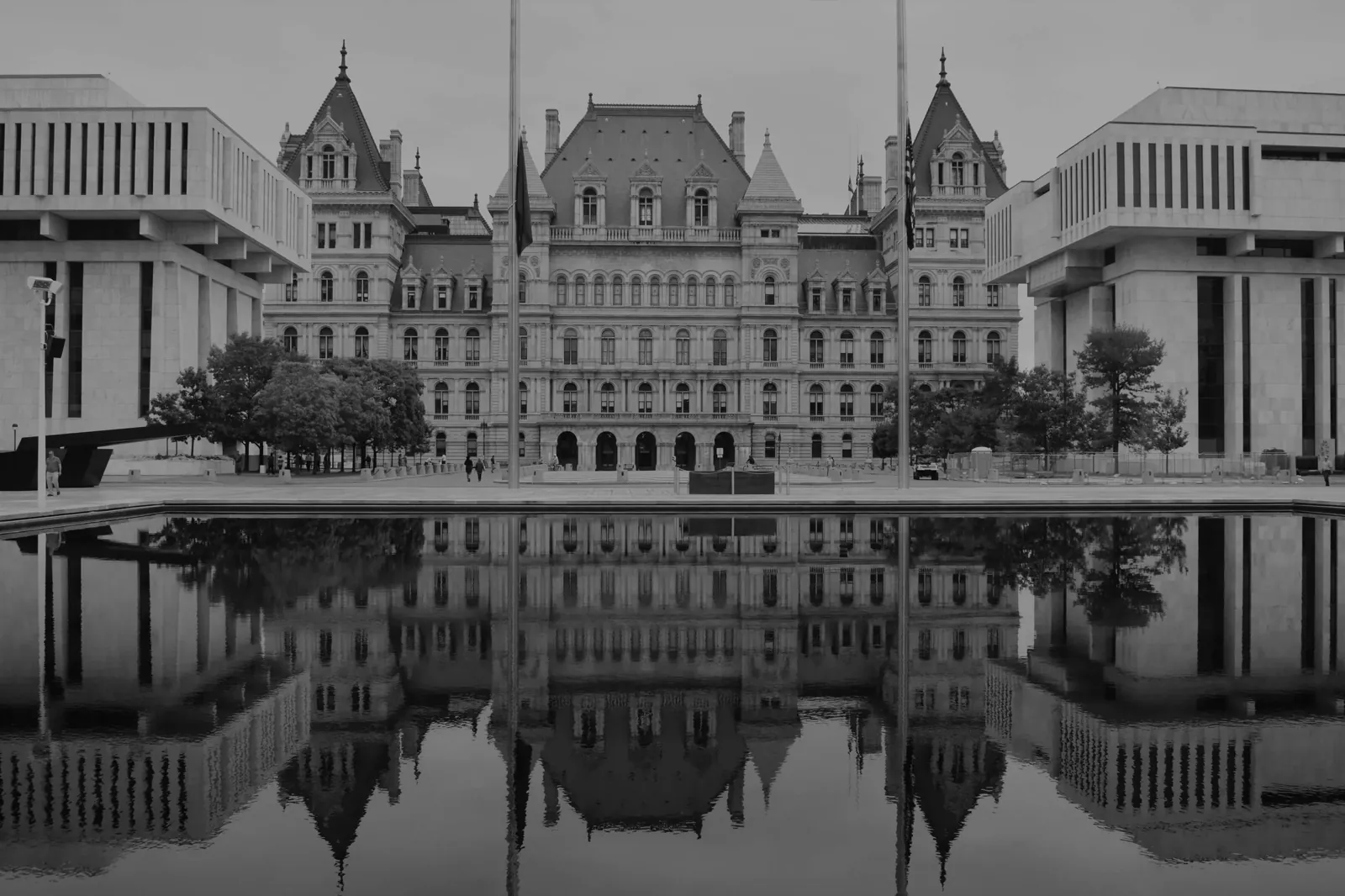 The New York State Capitol in Albany reflected in the Empire State Plaza pool